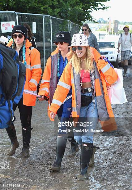 Suki Waterhouse, Cara Delevingne and Clara Paget attend day 1 of Glastonbury Festival on June 24, 2016 in Glastonbury, England.