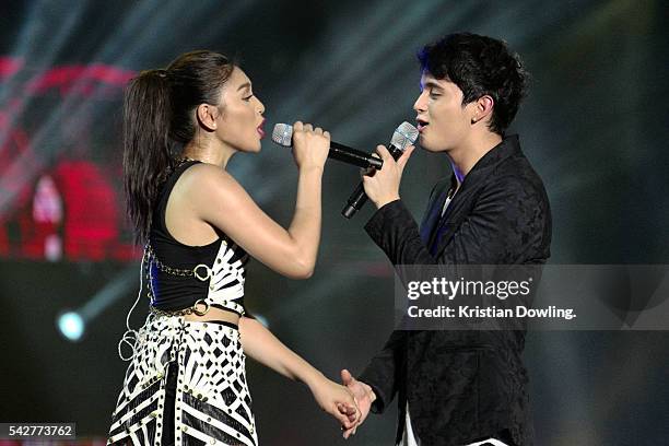 Filipino pop darlings James Reid and Nadine Lustre perform on-stage at the 2nd edition of MTV Music Evolution Manila 2016 staged at SM Mall of Asia...