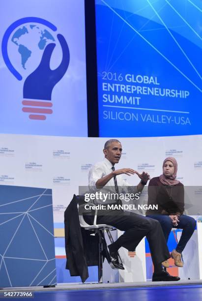 President Barack Obama speaks during a discussion with entrepreneurs including Mai Medhat at the Global Entrepreneurship Summit at Stanford...