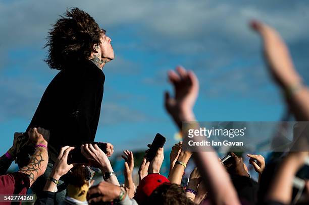 Oliver Sykes of "Bring Me The Horizon" performs on the Other Stage during the Glastonbury Festival at Worthy Farm, Pilton on June 24, 2016 in...