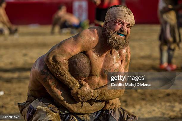 Players fight for possession of the ball during the final match of The Calcio Storico Fiorentino between the Santo Spirito Bianchi Team and the La...