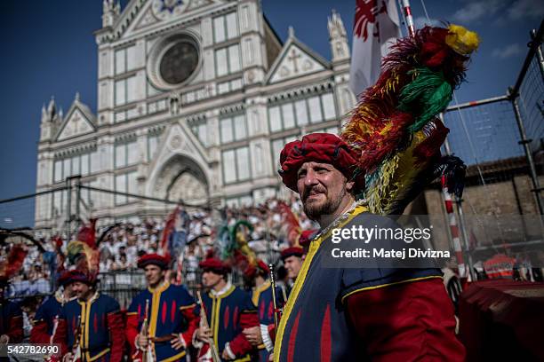 Men in traditional dress wait before the final match of The Calcio Storico Fiorentino between the Santo Spirito Bianchi Team and the La Santa Croce...