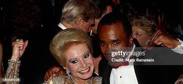 Portrait of American socialite and philanthropist Dianne Kay and boxer Sugar Ray Leonard as they pose together at the American Cancer Ball...