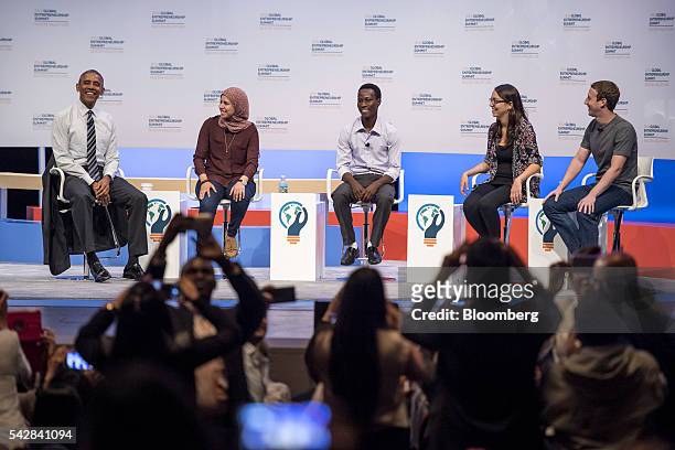 President Barack Obama, left, speaks as Mai Medhat, chief executive officer and founder of Eventtus, Jean Bosco Nzeyimana, founder and chief...
