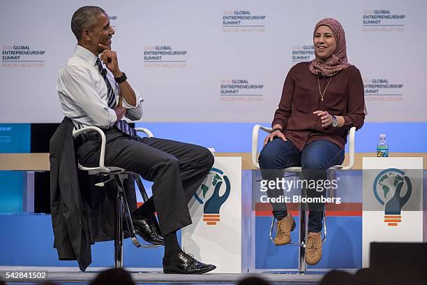 Mai Medhat, chief executive officer and founder of Eventtus, left, speaks as U.S. President Barack Obama listens during the 2016 Global...
