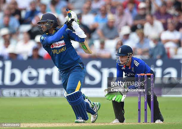 Sri Lanka Captain Angelo Mathews batting as Jos Buttler of Englandlooks on during the 1st Royal London ODI between England and Sri Lanka at Trent...