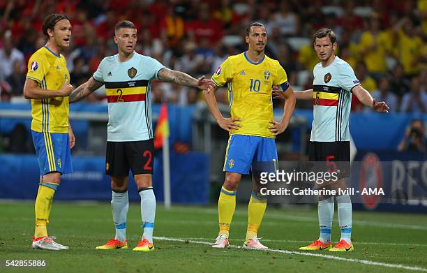Zlatan Ibrahimovich of Sweden stands between Toby Alderweireld and Jan Vertonghen of Belgium during the UEFA EURO 2016 Group E match between Sweden...