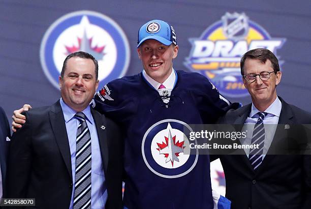 Patrik Laine reacts after being selected second overall by the Winnipeg Jets during round one of the 2016 NHL Draft on June 24, 2016 in Buffalo, New...