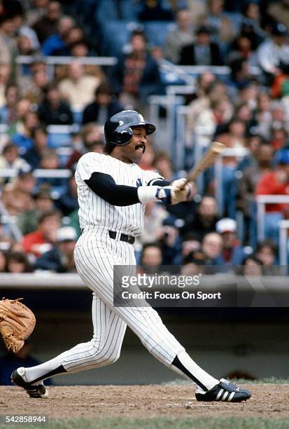 Oscar Gamble of the New York Yankees bats during an Major League Baseball game circa 1982 at Yankee Stadium in the Bronx borough of New York City....