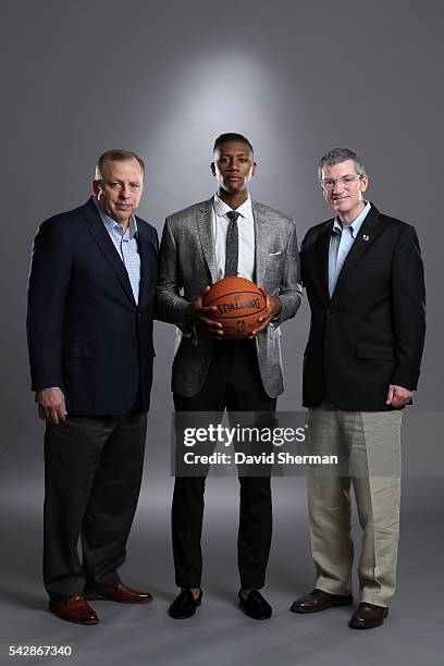 Minnesota Timberwolves 2016 NBA Draft Pick Kris Dunn poses with Tom Thibodeau, President of Basketball Operations and Head Coach and Scott Layden,...