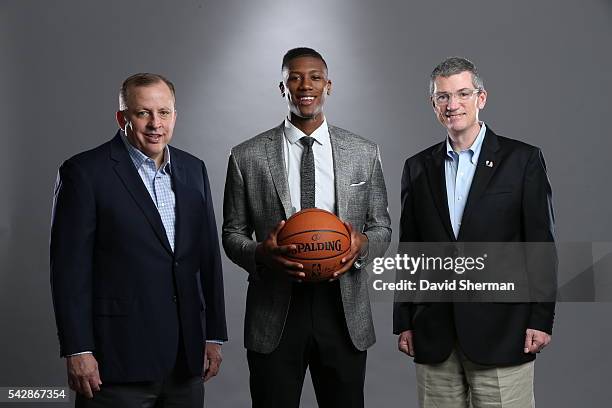Minnesota Timberwolves 2016 NBA Draft Pick Kris Dunn poses with Tom Thibodeau, President of Basketball Operations and Head Coach and Scott Layden,...