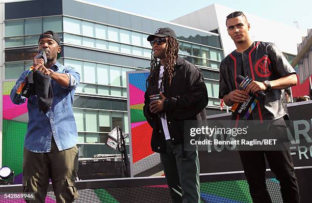 Co-host Ray J, recording artist Ty Dolla Sign and co-host Quincy Brown speak onstage at 106 & Park sponsored by Apple Music during the 2016 BET...