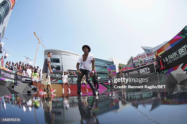 Music fan dances onstage at 106 & Park sponsored by Apple Music during the 2016 BET Experience at Microsoft Square on June 24, 2016 in Los Angeles,...