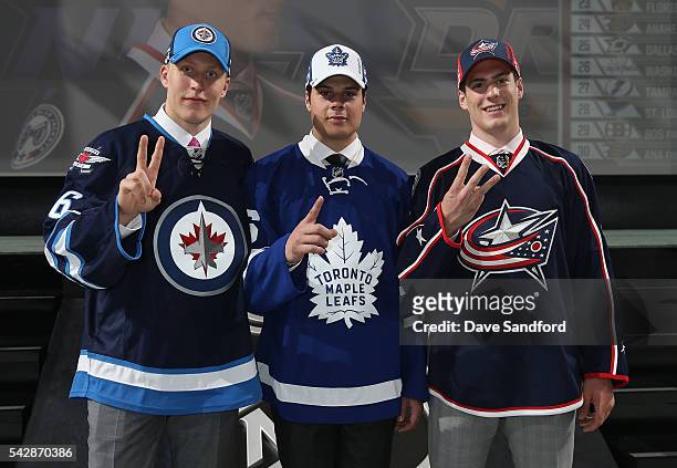 Patrik Laine, selected second overall by the Winnipeg Jets, Auston Matthews, selected first overall by the Toronto Maple Leafs, and Pierre-Luc...
