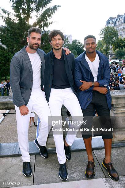 Actor Luca Calvani, model Andres Velencoso Segura and american football player Brice Butler attend the Berluti Menswear Spring/Summer 2017 show as...
