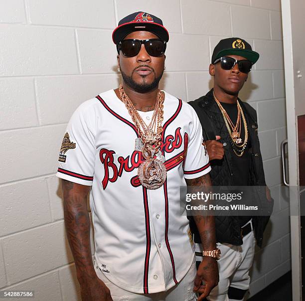 Young Jeezy and Jadarius Jenkins pose backstage at Birthday Bash at Philips Arena on June 18, 2016 in Atlanta, Georgia.