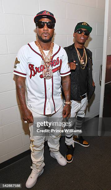Young Jeezy and Jadarius Jenkins pose backstage at Birthday Bash at Philips Arena on June 18, 2016 in Atlanta, Georgia.