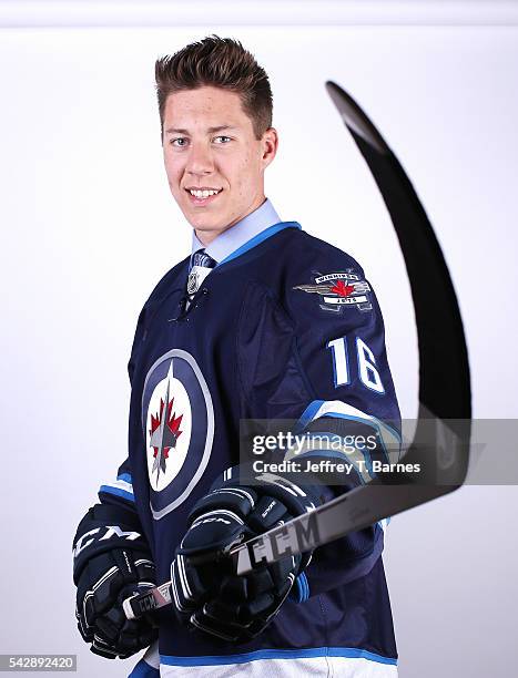 Logan Stanley poses for a portrait after being selected 18th overall by the Winnipeg Jets in round one during the 2016 NHL Draft on June 24, 2016 in...