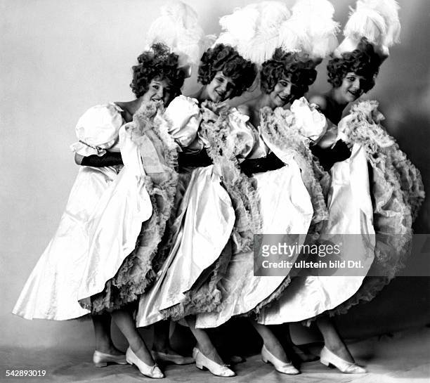 Revue girls Four dancers of the Tiller-Girls dance troupe in ancient costumes of 1898 - 1928 - Published by: 'B.Z.' 36, 1928 Vintage property of...