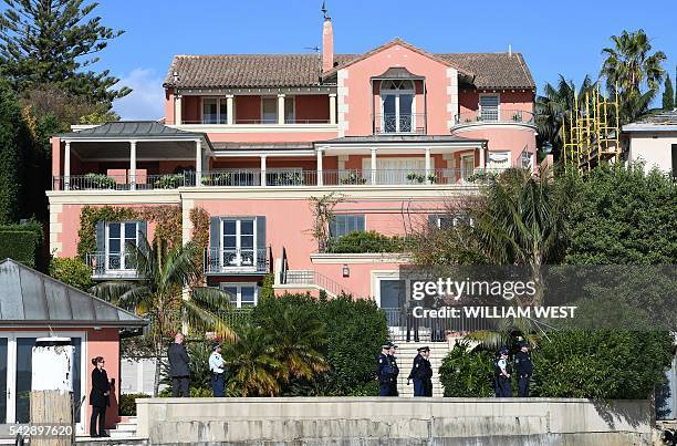 Australia's Prime Minister Malcolm Turnbull's Point Piper mansion, worth a reported 50 million Australian dollars , is guarded by police officers...