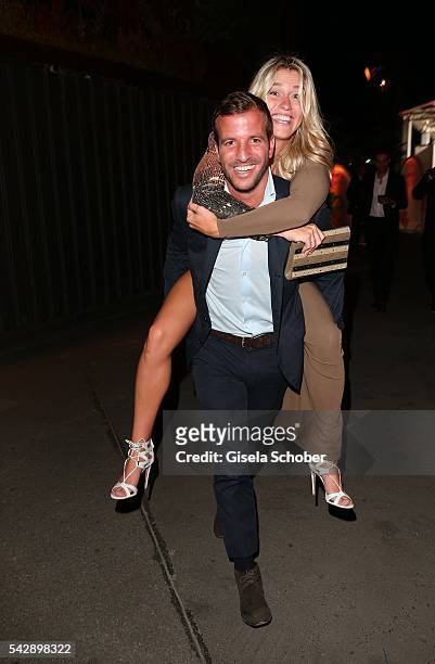Rafael van der Vaart carries his girlfriend Estavana Polman during the Raffaello Summer Day 2016 to celebrate the 26th anniversary of Raffaello on...
