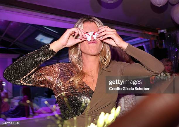 Rafael van der Vaart and his girlfriend Estavana Polman jokes during the Raffaello Summer Day 2016 to celebrate the 26th anniversary of Raffaello on...