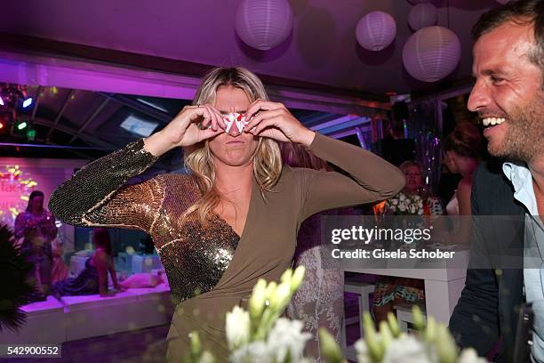 Rafael van der Vaart and his girlfriend Estavana Polman jokes during the Raffaello Summer Day 2016 to celebrate the 26th anniversary of Raffaello on...