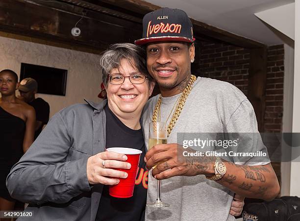 Mitchell & Ness' Director of Merchandising, Authentics Lynn Bloom and retired professional basketball player Allen Iverson attend Allen Iverson 2001...