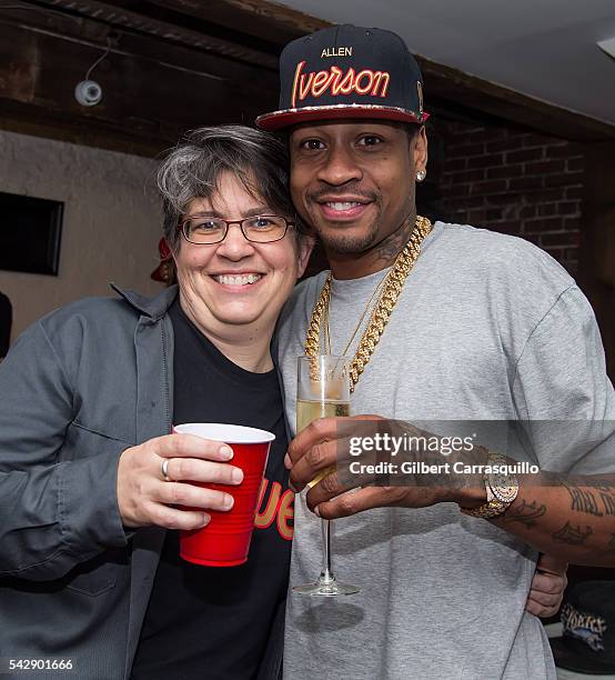 Mitchell & Ness' Director of Merchandising, Authentics Lynn Bloom and retired professional basketball player Allen Iverson attend Allen Iverson 2001...