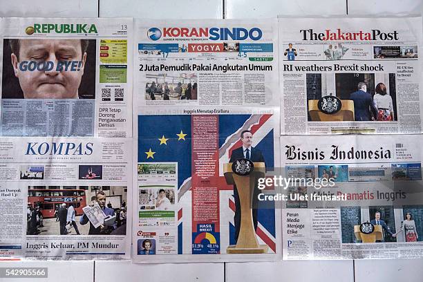 In this photo illustration, the Indonesian newspaper The Jakarta Post shows the cover headline which reads 'RI weathers Brexit shock', REPUBLIKA...