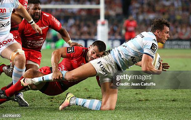 Juan Imhoff of Racing 92 and Jonathan Pelissie of RC Toulon in action during the Final Top 14 between Toulon and Racing 92 at Camp Nou on June 24,...