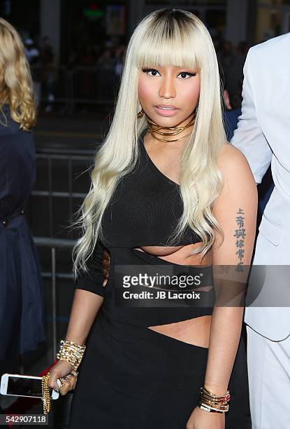 Nicki Minaj arrives at the premiere of New Line Cinema's 'Barbershop: The Next Cut' at TCL Chinese Theatre on April 6, 2016 in Hollywood, California.