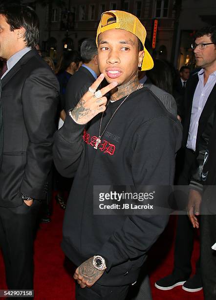 Rapper Tyga arrives at the premiere of New Line Cinema's 'Barbershop: The Next Cut' at TCL Chinese Theatre on April 6, 2016 in Hollywood, California.