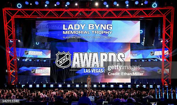 Miss Universe 2012 Olivia Culpo presents the Lady Byng Memorial Trophy during the 2016 NHL Awards at The Joint inside the Hard Rock Hotel & Casino on...