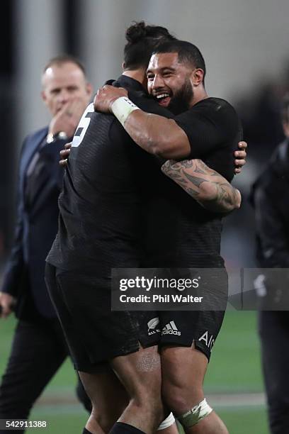 Lima Sopoaga and Elliot Dixon of the All Blacks embrace following the International Test match between the New Zealand All Blacks and Wales at...