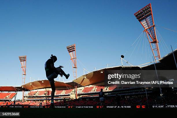 Gamer Bryce Gibbs of the Blues warms up before the round 14 AFL match between the Greater Western Sydney Giants and the Carlton Blues at Spotless...