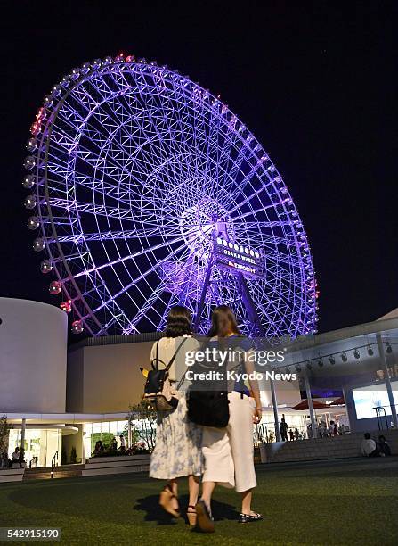 Photo taken June 23 in the western Japan city of Suita shows the tallest Ferris wheel in Japan, which will open to the public from July 1. From the...