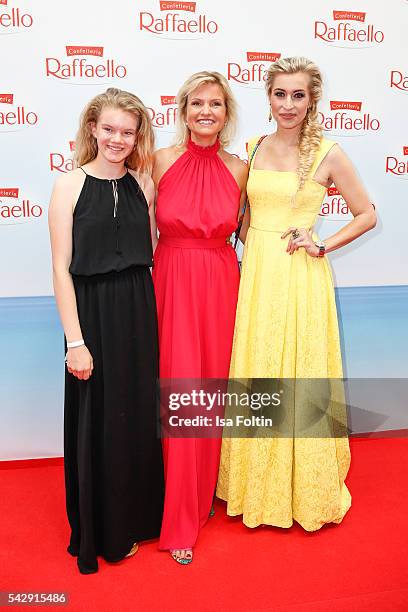 German moderator Carola Ferstl with her daughter Julia Ferstl and german moderator Verena Kerth in the colors of german ensign attend the Raffaello...