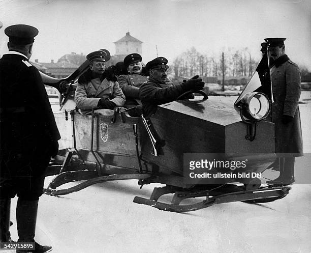 Prince Joachim of Prussia with the Commander of Boyen Fortress , Hans Busse, in a motorized sledge- undated