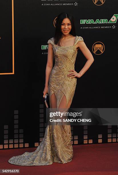 Singapore pop music singer Tanya Chua arrives to attend the 27th Golden Melody Awards in Taipei on June 25, 2016. Some of Mandarin pop's biggest...