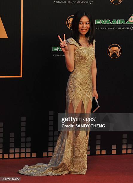 Singapore's pop music singer Tanya Chua arrives to attend the 27th Golden Melody Awards in Taipei on June 25, 2016. Some of Mandarin pop's biggest...