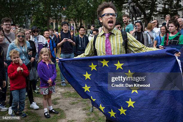 Small group of people gather to protest on Parliament Square the day after the majority of the British public voted to leave the European Union on...