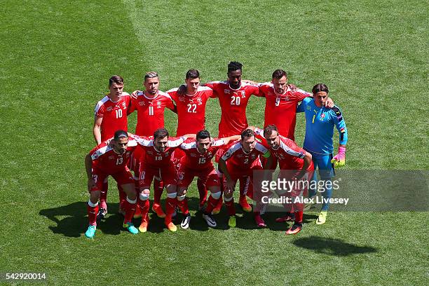 Switzerland players line up for the team photos prior to the UEFA EURO 2016 round of 16 match between Switzerland and Poland at Stade...