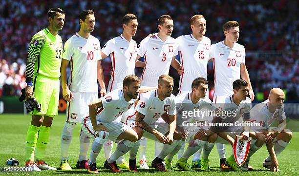 Poland players line up for the team photos prior to the UEFA EURO 2016 round of 16 match between Switzerland and Poland at Stade Geoffroy-Guichard on...