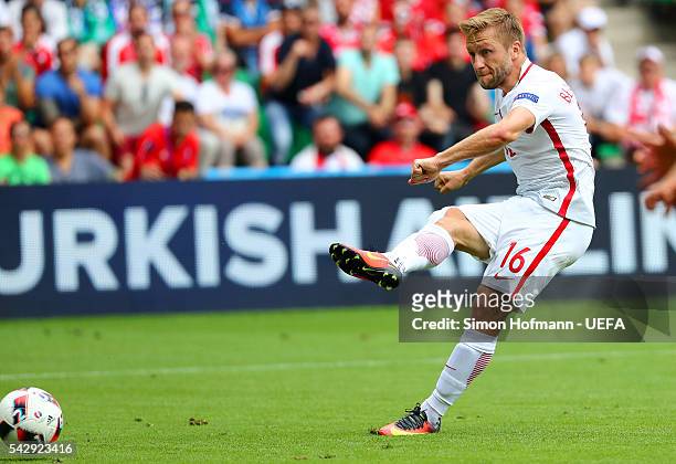 Jakub Blaszczykowski of Poland scores the opening goal during the UEFA EURO 2016 round of 16 match between Switzerland and Poland at Stade...