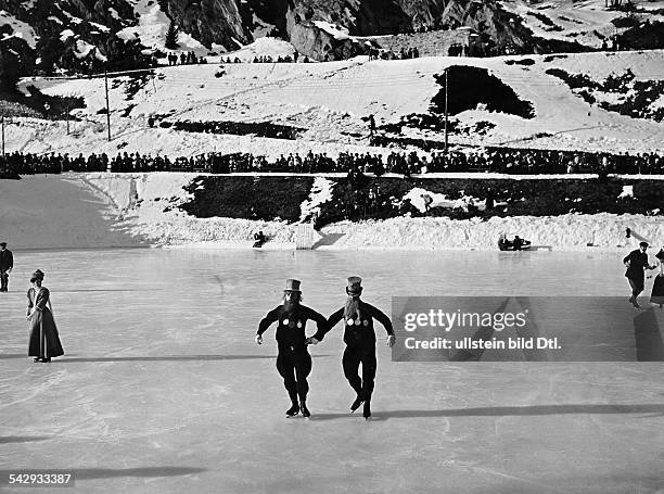 Eislaufen, Zwei Komiker auf dem Eis bei einem Sportfest in St. Moritz- 1908veröffentlicht: Nr. 50/1908Foto: Wehrli AG