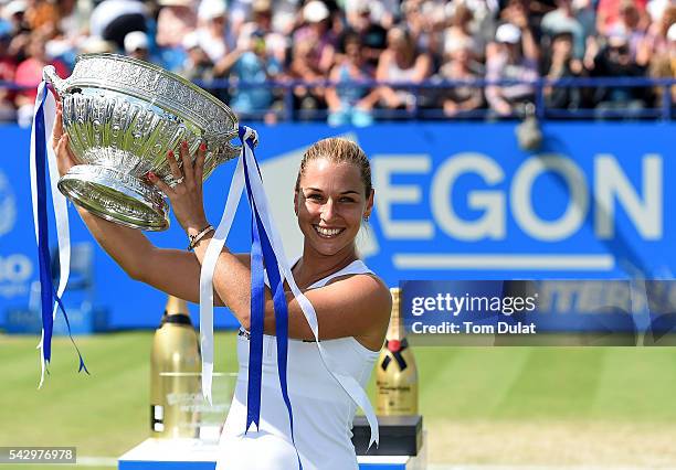 Dominika Cibulkova of Slovakia poses with the trophy after winning the final match against Karolina Pliskova of Czech Republic on day seven of the...