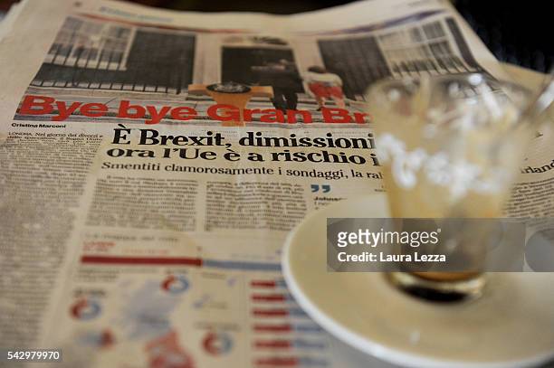 An Italian newspaper declaring about Brexit and UK leaving the European Union is displayed inside a bar on June 25, 2016 in the town of Nola near...