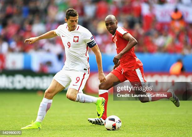 Robert Lewandowski of Poland controls the ball during the UEFA EURO 2016 round of 16 match between Switzerland and Poland at Stade Geoffroy-Guichard...