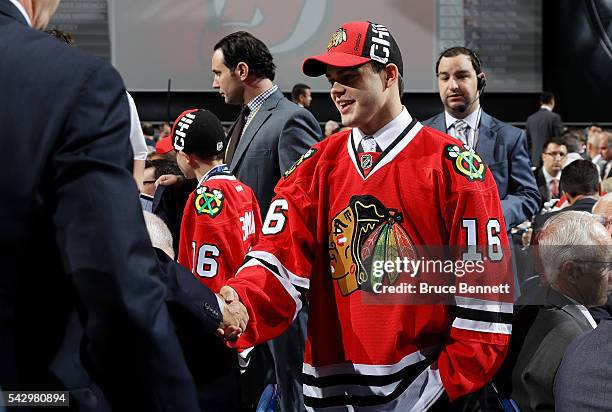 Alexander Debrincat reacts after being selected 39th by the Chicago Blackhawks during the 2016 NHL Draft on June 25, 2016 in Buffalo, New York.